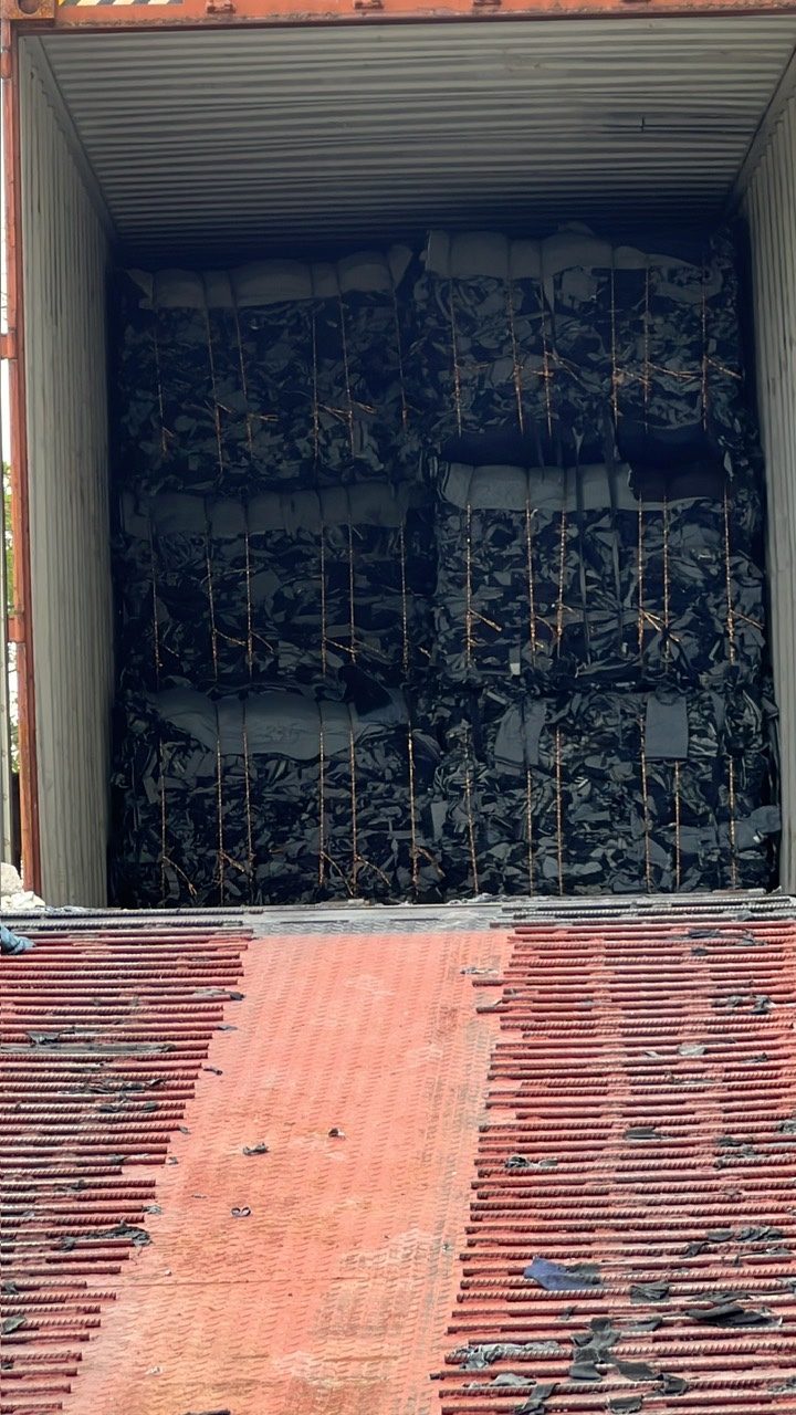 Denim cuttings loaded in a container