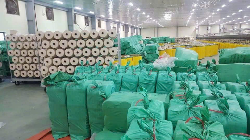OE yarn cones and packed bags